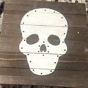 Grey and white light up skull decor